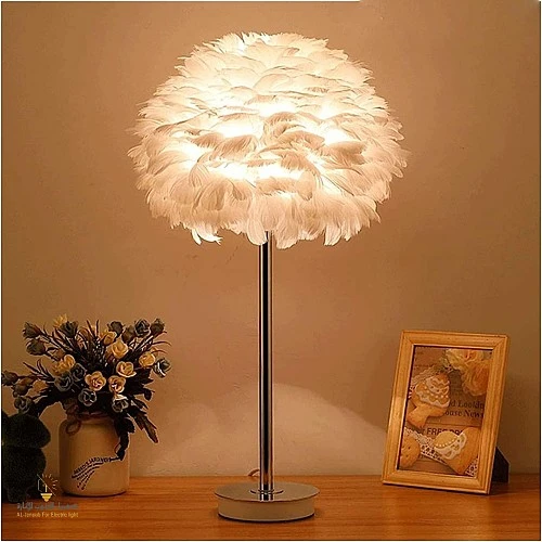  منتج ابجورة مصباح طاولة إضاءة ساحرة ومريحه شكل ريشي ولون فضي فخم E27-T/B4832/CH