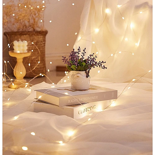 اضاءة سلسة عقد زينة LED لون الانارة اصفر تعمل بالبطارية طول 2 متر