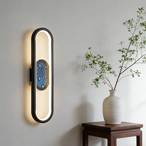 اضاءة جدارية بيضاوي اسود لون الانارة 3 اضاءات مقاس 40 سم 15 واط